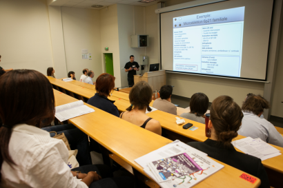 Conférence devant un public de doctorants