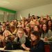 Anciens étudiants et étudiants actuels réunis dans un amphi de l'IUT