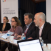 Anne-Emmanuelle Grossi, Frédérique Penilla, Jacques bahi et Frédéric Muyard assis à une table de réunion devant une banière indiquant "Conseil d'orientation stratégique"